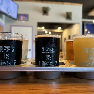 three beers on a tray