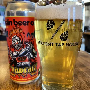 a glass of beer and a can