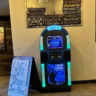 a beer kiosk and a sign