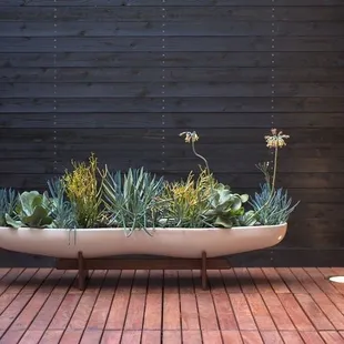 Featured partnerships at Dwell Home Venice with Vessel Architectural Pottery and IPE decking tiles -- Venice, California