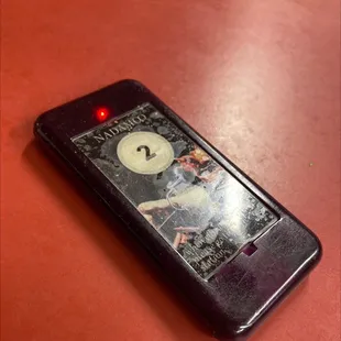 Pagers since food made to order, takes 20 minutes for a bacon wrapped burro