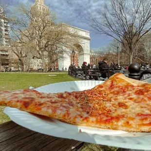 Enjoying Cheese Pizza Slice in the park. $2 + tip