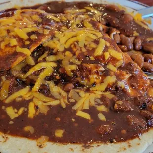 Huevos Rancheros Your choice of flower or corn tortilla