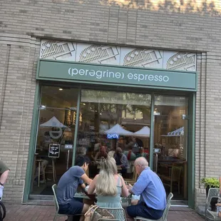 a group of people eating outside