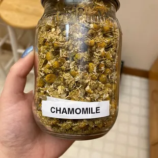 The chamomile tea in a jar