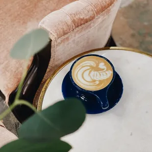 Latte and cozy seating at Perets