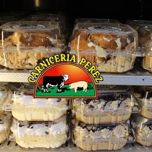 a display of cupcakes and pastries