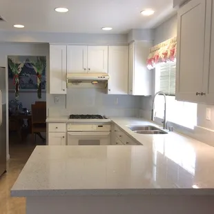 new kitchen cabinets, countertop and flooring