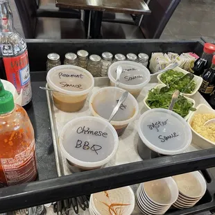 Sauce and utensil/dish cart.