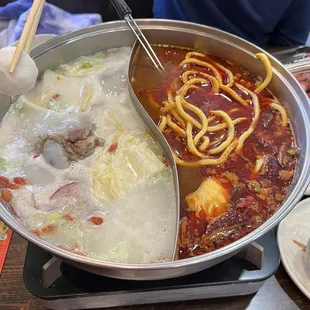 Pork bone, with a huge pork bone. Spicy, with half the peppers in all of Asia .