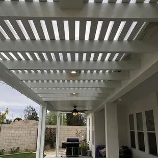 Patio with lights and fan.
