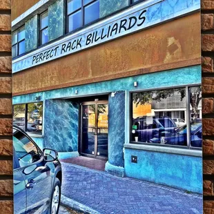 a car parked in front of a building