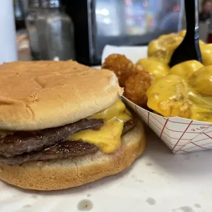a hamburger and french fries on a table