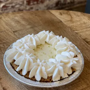 a pie topped with whipped cream