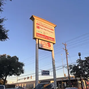 Sign for the restaurant off of 1604