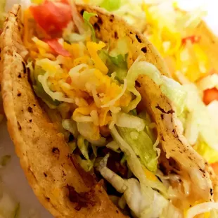 a taco on a white plate