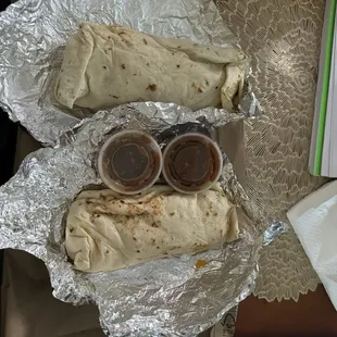 Smaller than my hand large extra meat chicharrones burrito and bacon burrito breakfast bland hard potatoes