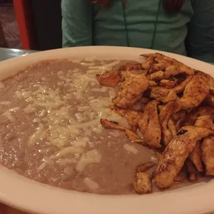 This is Taylor's kids meal of grilled chicken and beans.