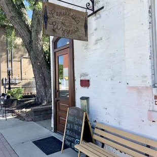 a bench outside a restaurant