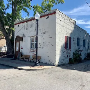 a white building with red trim