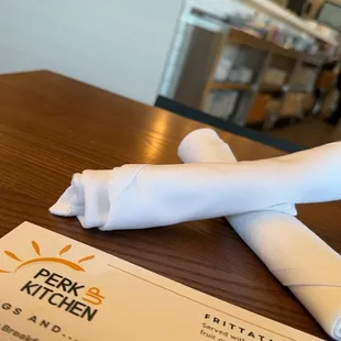 a folded napkin on a table