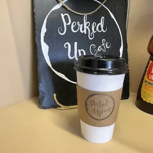 a cup of coffee on a counter