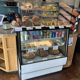 Fresh pastries and canned drinks.