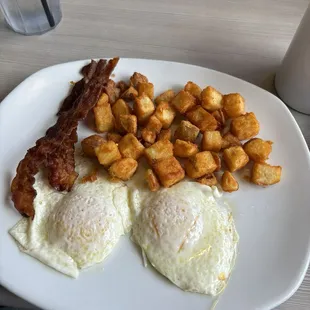 Eggs with potato chunks, bacon
