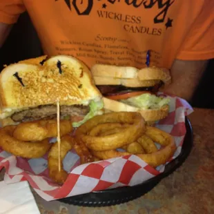 a sandwich and onion rings