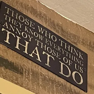 a close up of a sign on a wall
