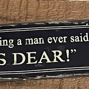 a sign on a door saying,&apos;smartest thing a man ever said yes dear &apos;