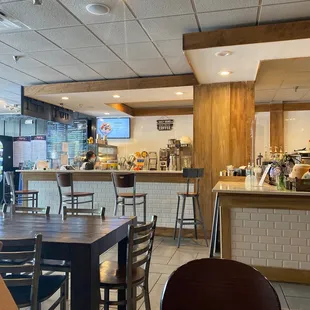 tables and chairs in a coffee shop