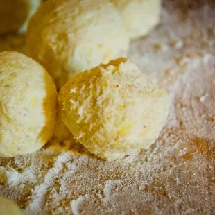 doughnuts on a floured surface