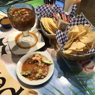 Large ceviche with some pulled out to show contents.