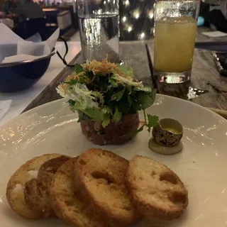 Tuna Tartare with a Quail Egg, Baguette Crostini*