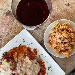 Eggplant Parmigiana Dinner + side of the rotelli pink  with their house wine