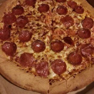 a pepperoni pizza in a box