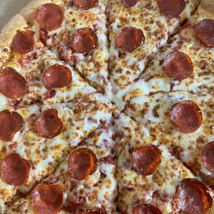 a pepperoni pizza in a box