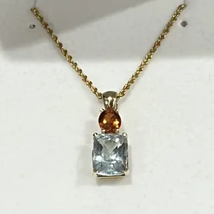 Hessanite garnet (above) and an aquamarine faceted from rough I found in Namibia. A piece you can wear every day.