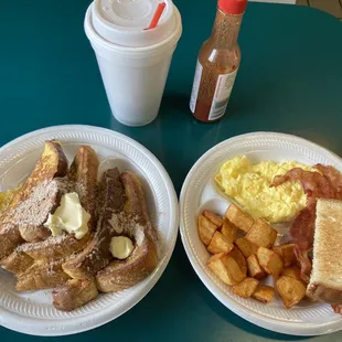 Home style potatoes breakfast with two sides of French toast.