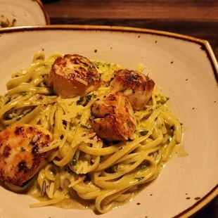 Basil pasta with  scallops.