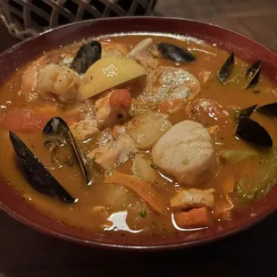 Cioppino -tomato based seafood soup, SO difficult to find.  Even better than famous Taddich Grill in San Francisco.