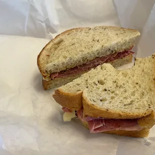 My New Yorker: corned beef, pastrami, and Swiss cheese with mustard on the best rye bread ever!!
