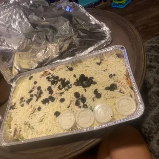 a pan of pizza on a table