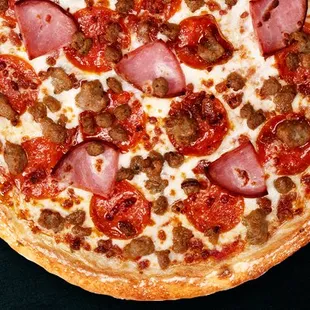 Our "Meat Heaven", a delicious combination of all our savory meats. It's certainly a mouthful.