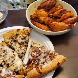 I had to add my own sauce and cook the wings an extra 20 min, just to be edible. The white pizza has zero garlic sauce.
