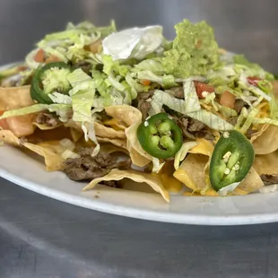 House nachos with steak