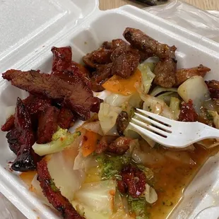 a take out container of food