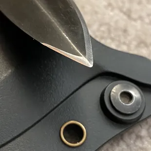 Colnel with slight top edge sharpening, shaped and sharpened after heavy damage.