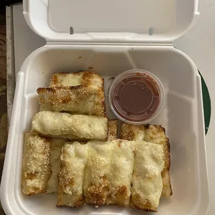 a takeout box of food